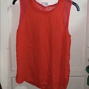Orange top with open back